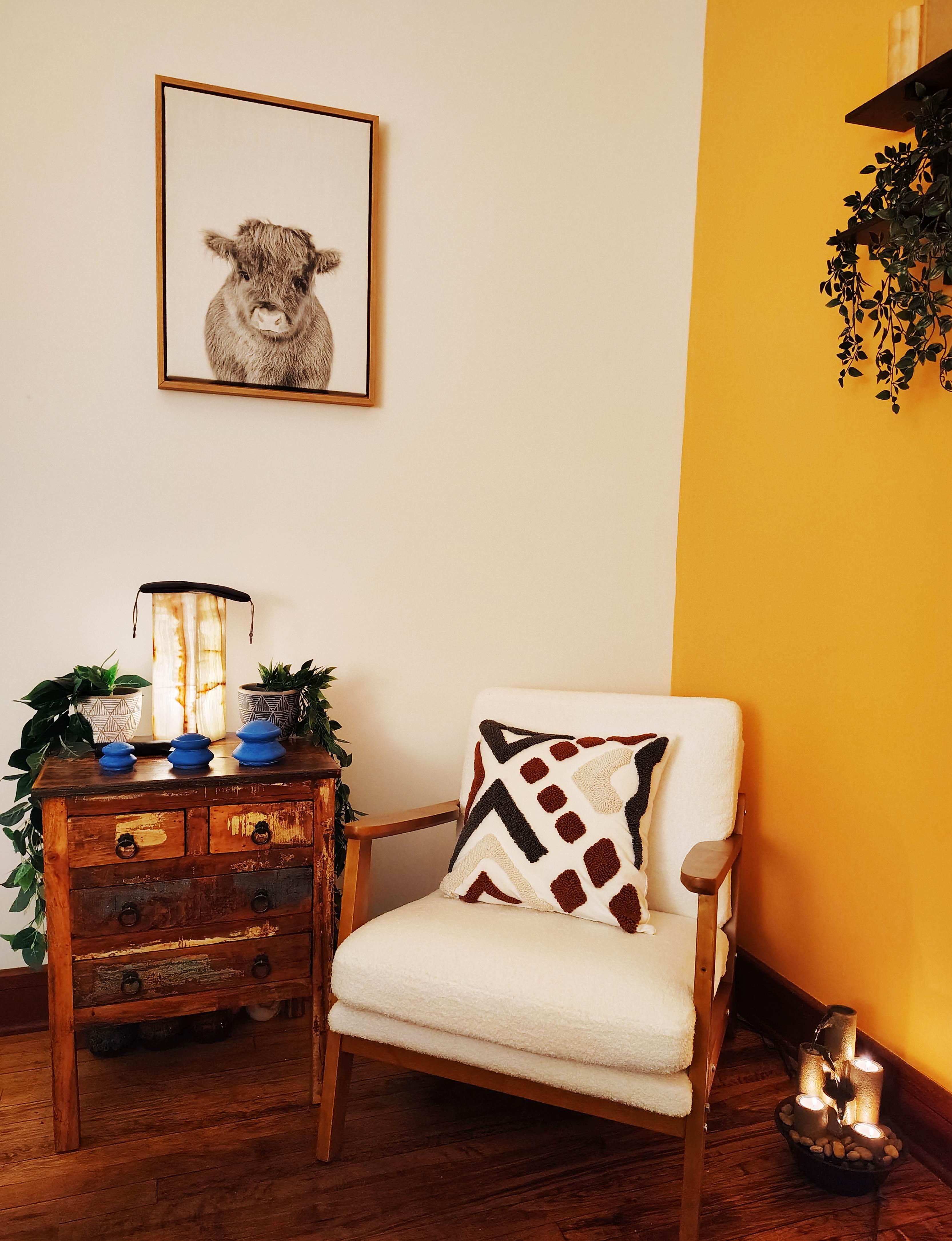 Tranquil massage room with comfortable seating